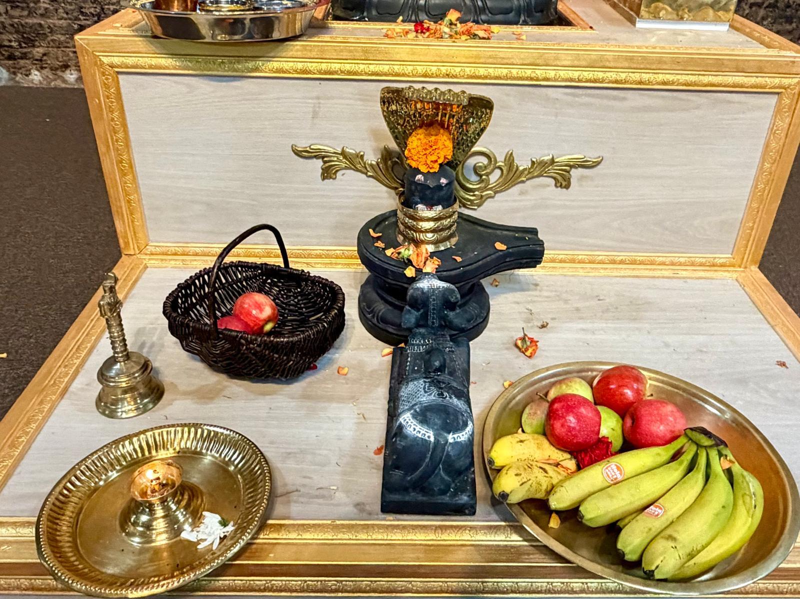 Fruits and offerings placed before the shrine