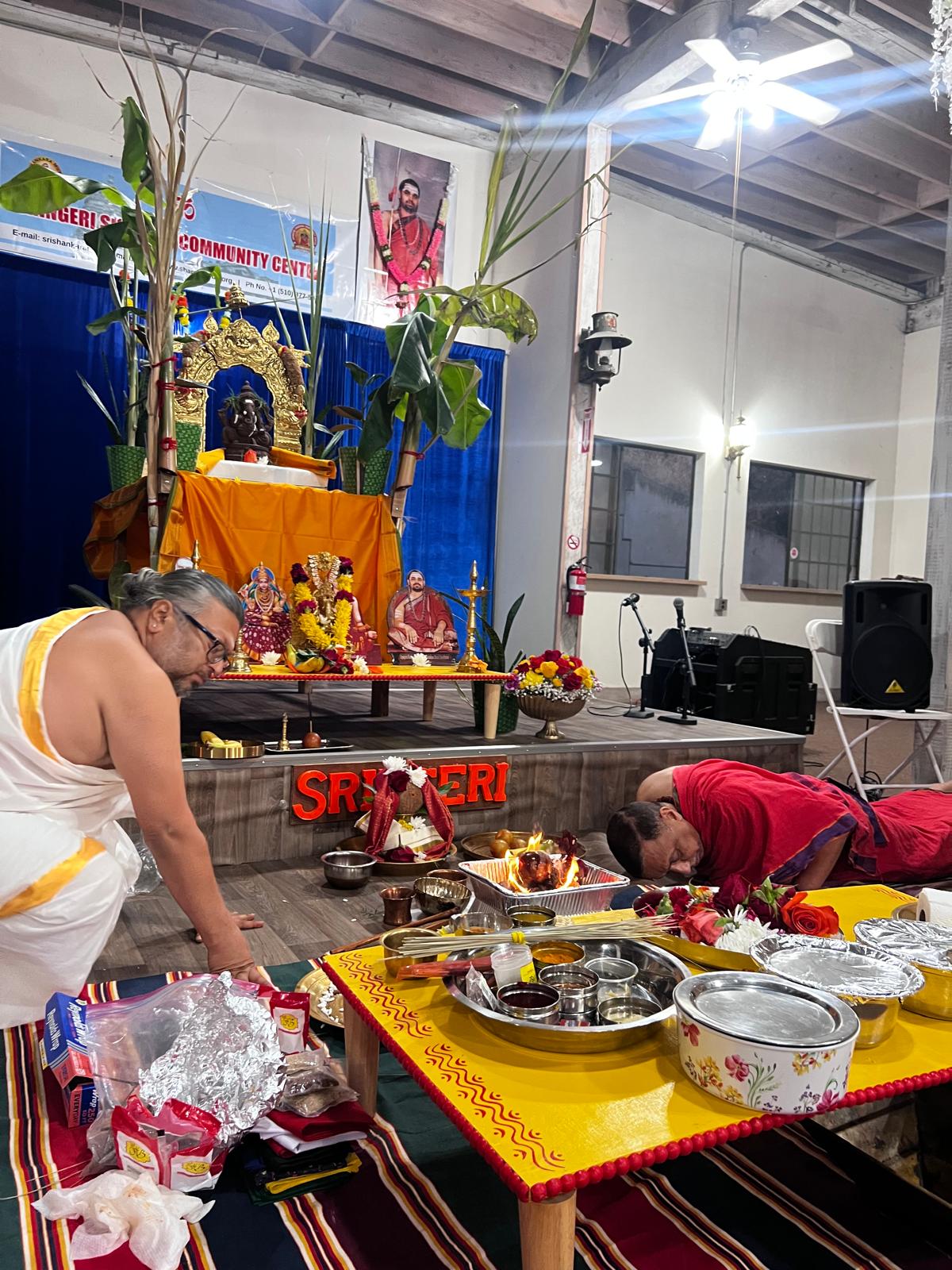 Priest preparing puja materials